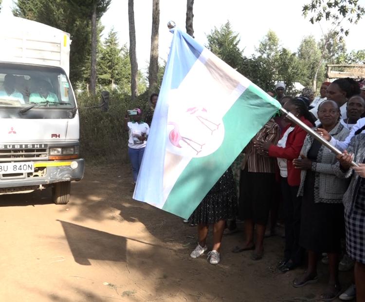 County Chief Officer for Agriculture, Engineer Margaret Kinyanjui, officially flags off nine tonnes of beans produced by the Ushirikiano Women Group at Kiambogo Centre in Gilgil Sub-County.
