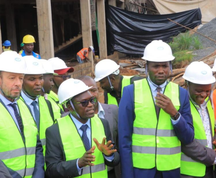 Broadcasting and Telecommunications Principal Secretary Stephen Isaboke (second left) and his Medical Services counterpart Dr. Ouma Oluga (centre) addressing the press after supervising the ongoing construction of the Kisii Cancer Centre.